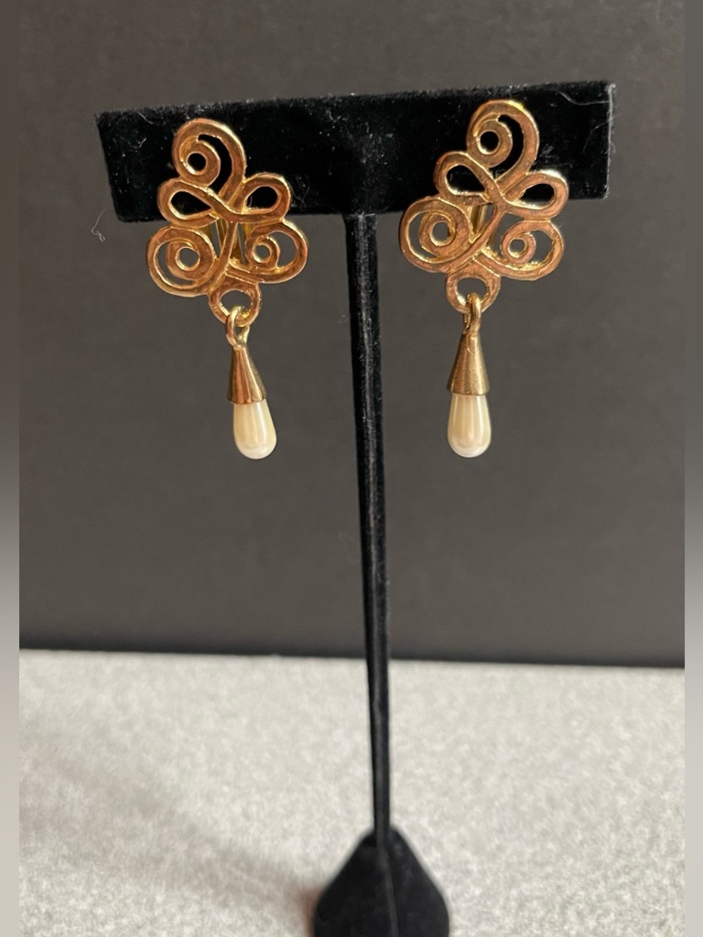 Gold Toned Filigree Drop Clip On Earrings With Cream Teardrop Pearls